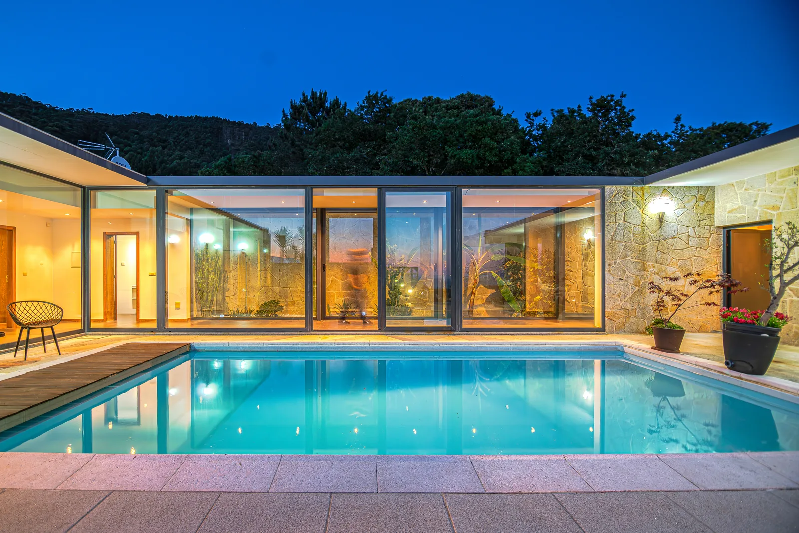 Luxury private villa with pool at twilight — your own home in Portugal